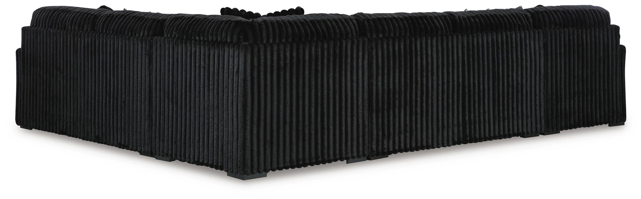 Black L-shaped sectional sofa with a distinctive vertical ribbed corduroy-like fabric texture, shown from the back and side.